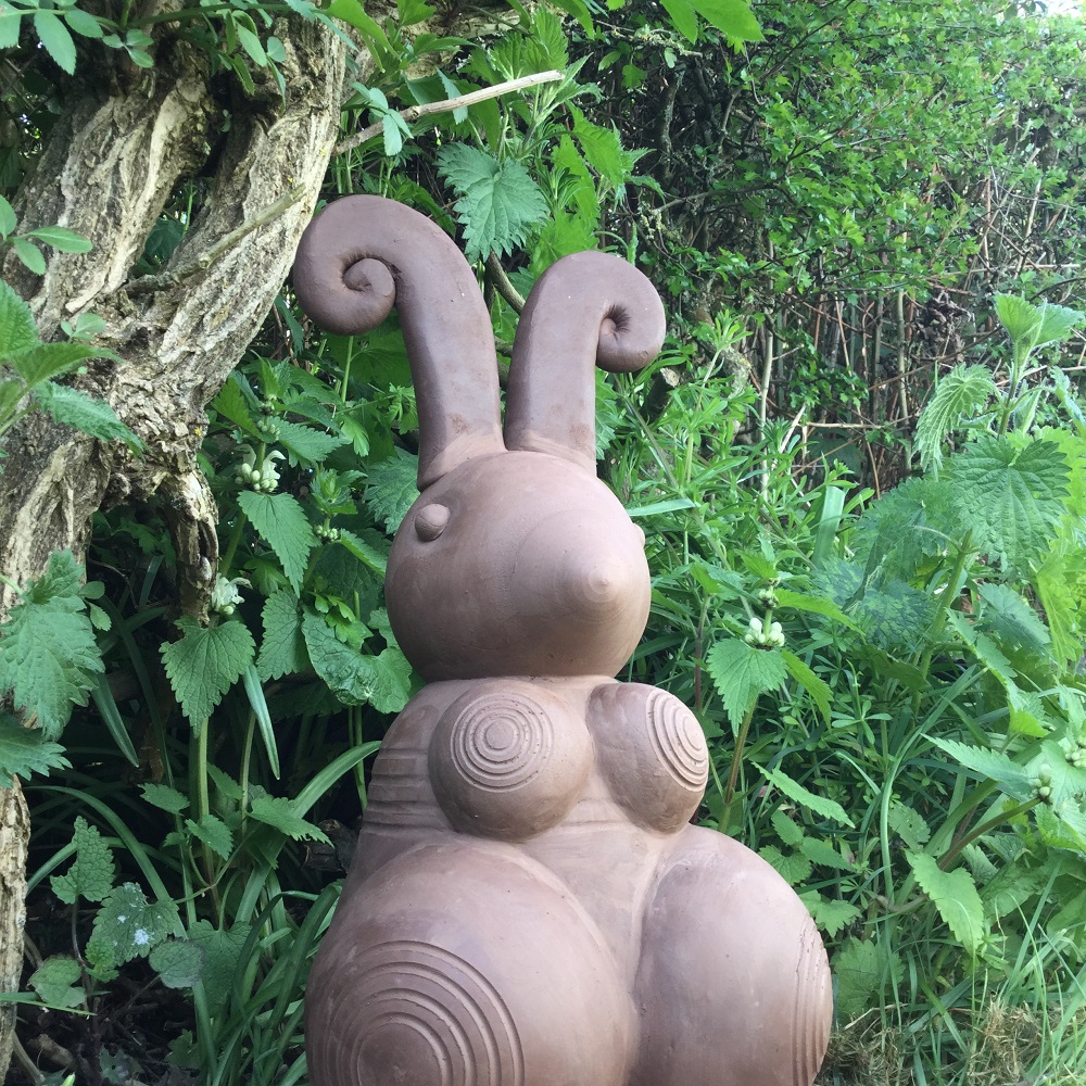 pottery rabbit made by jon williams for puzzle wood's easter pottery trail