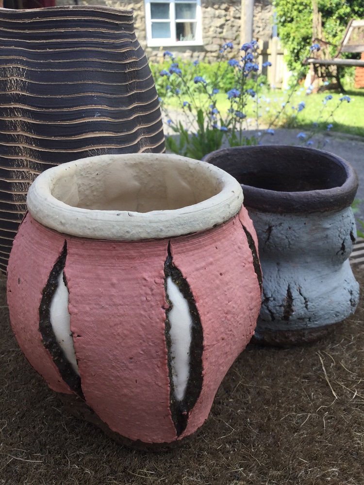 three thrown and altered brick clay pots by herefordshire artist jon williams