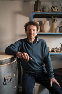 Ceramic artist jon the potter williams in his artist studio in herefordshire