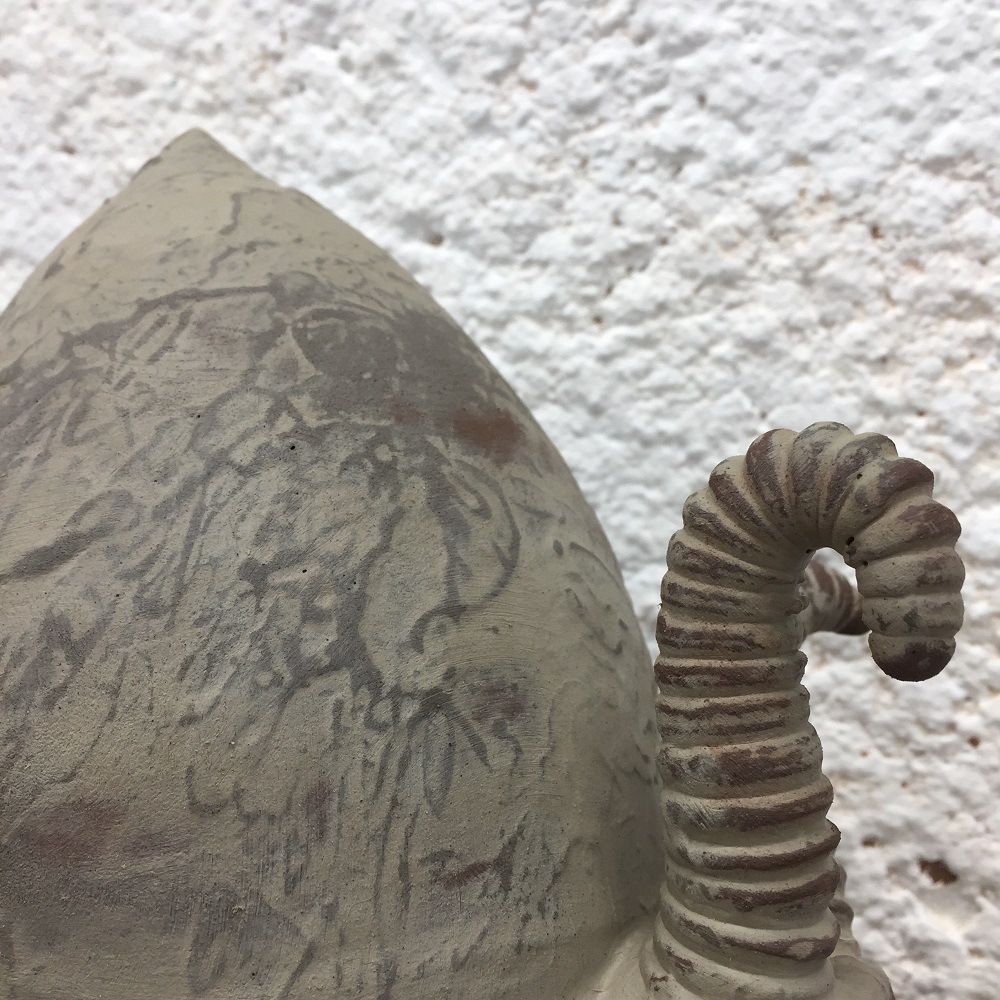 close up of a rocking ceramic snail by jon williams the flying potter