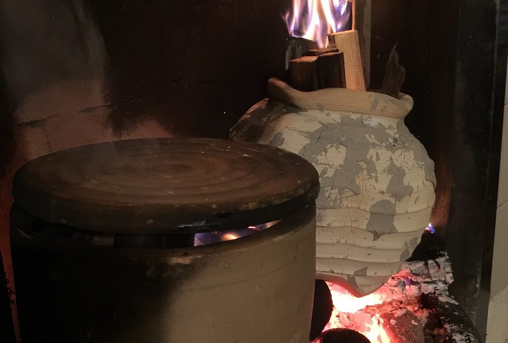 saggers on an open fire place at home with potter jon williams