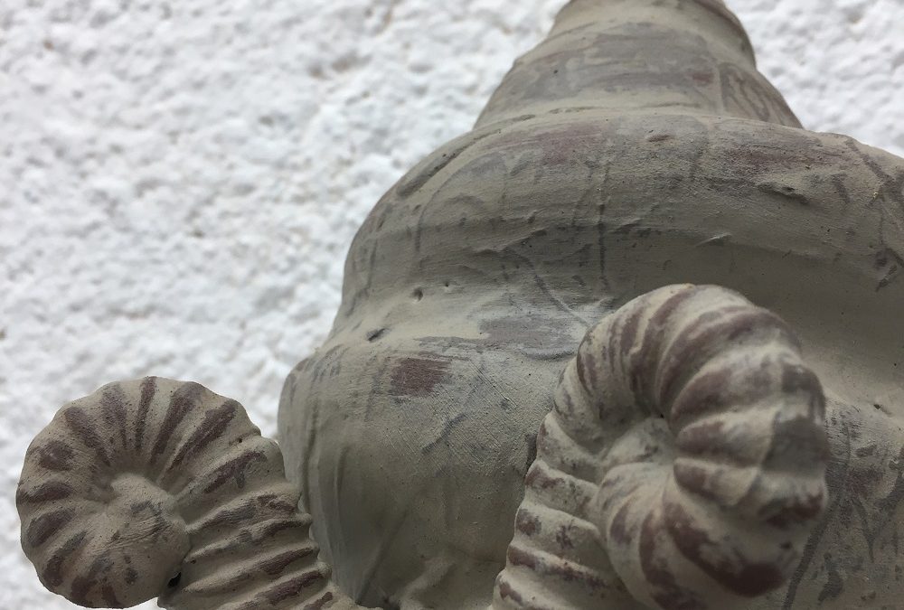 details of rocking snail sculpture by herefordshire artist potter jon williams